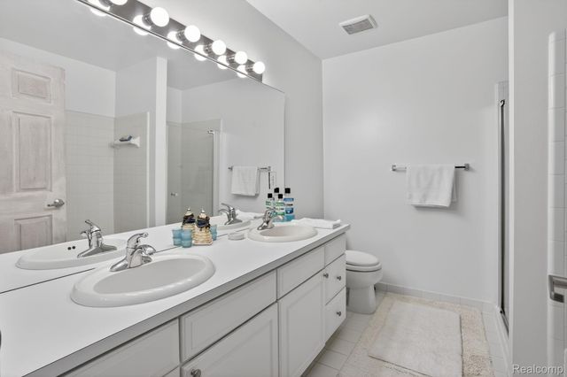 328 Four Seasons Drive, Lake Orion Village, MI 48360