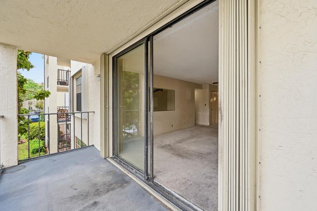 6195 Rock Island Road 210, Tamarac, FL 33319