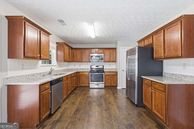 78 Saint Charles Place, Sharpsburg, GA 30277