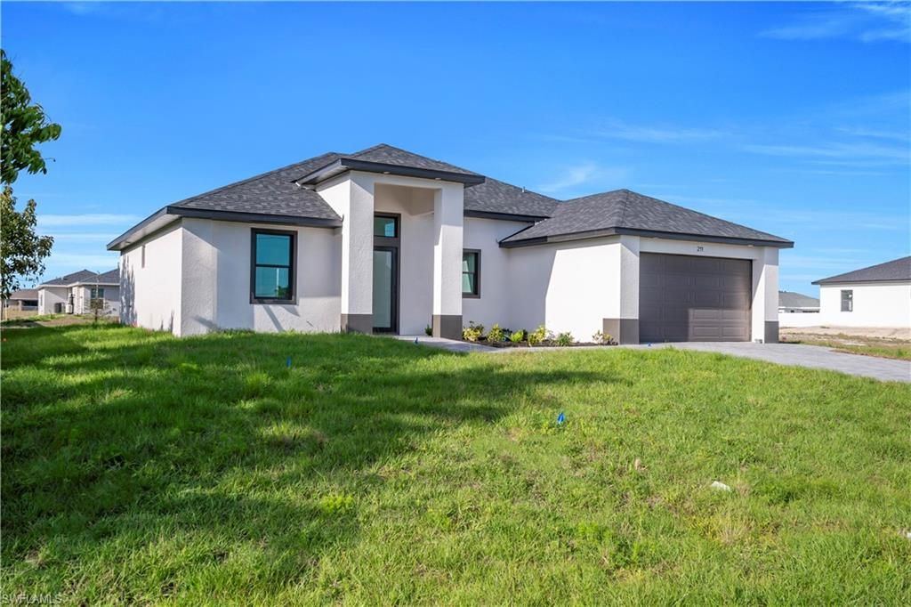 211 NE 15th TER, CAPE CORAL, FL 33909 — exterior