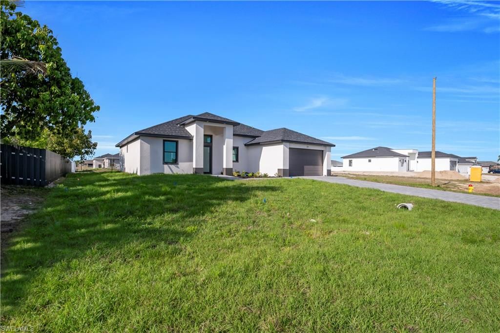 211 NE 15th TER, CAPE CORAL, FL 33909 — photo 2