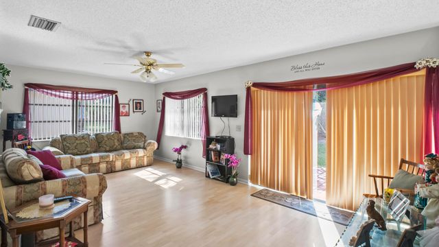 6329 Tall Cypress Circle, Greenacres, FL 33463