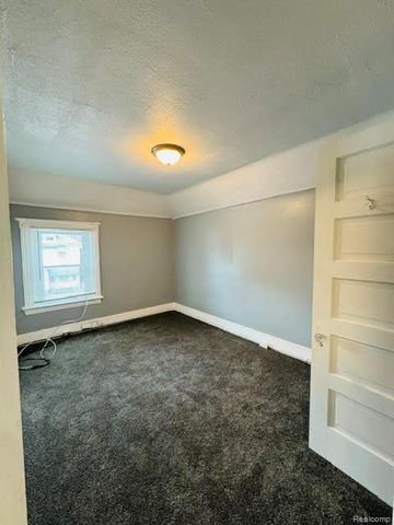 7714 E Canfield Street, Detroit, MI 48214