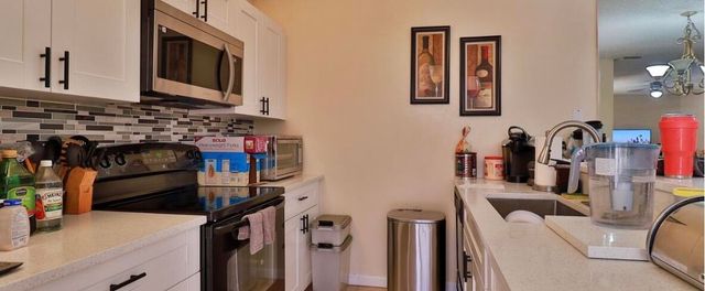 1034 Springdale Circle, Palm Springs, FL 33461