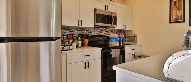 1034 Springdale Circle, Palm Springs, FL 33461