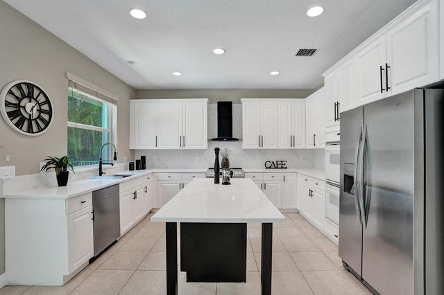 6020 NW 104th Lane, Parkland, FL 33076