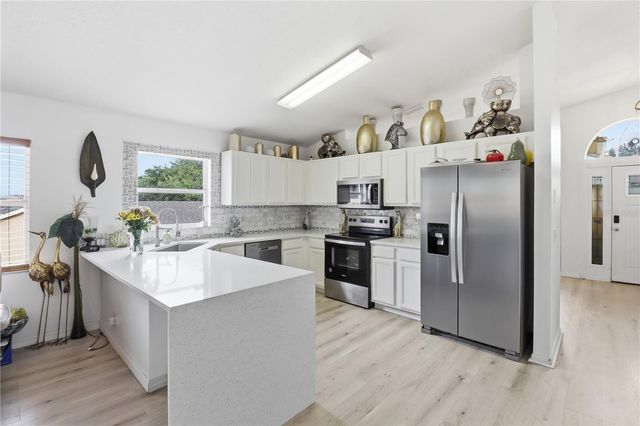 1514 MUIR CIRCLE, Clermont, FL 34711