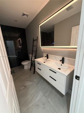 596 Ragan Dr, Miami Springs, FL 33166