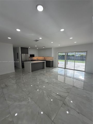 596 Ragan Dr, Miami Springs, FL 33166