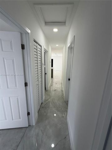 596 Ragan Dr, Miami Springs, FL 33166