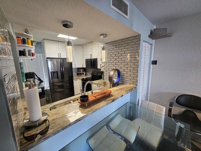 1105 Lake Shore Drive 102, Lake Park, FL 33403