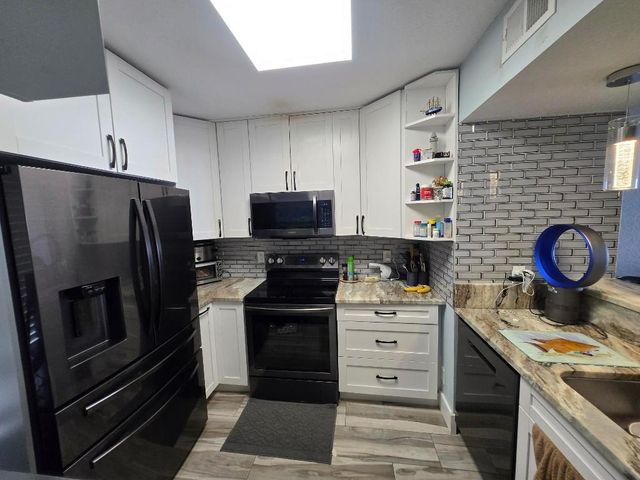 1105 Lake Shore Drive 102, Lake Park, FL 33403