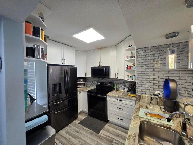 1105 Lake Shore Drive 102, Lake Park, FL 33403