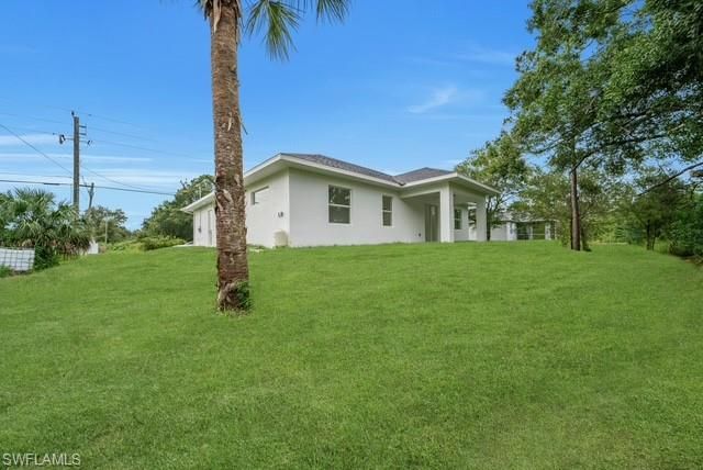 404 W 15th ST, Lehigh Acres, FL 33972