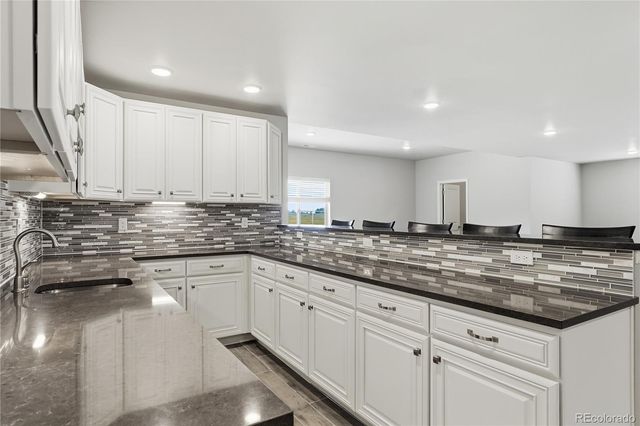 7933 Piney River Avenue, Littleton, CO 80125