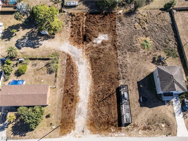 56 Illinoise RD, Lehigh Acres, FL 33936