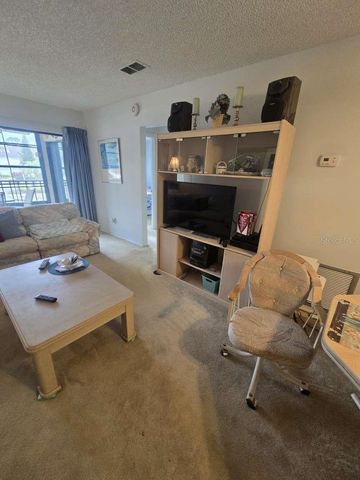 3240 CANDLE RIDGE DRIVE 204, Orlando, FL 32822