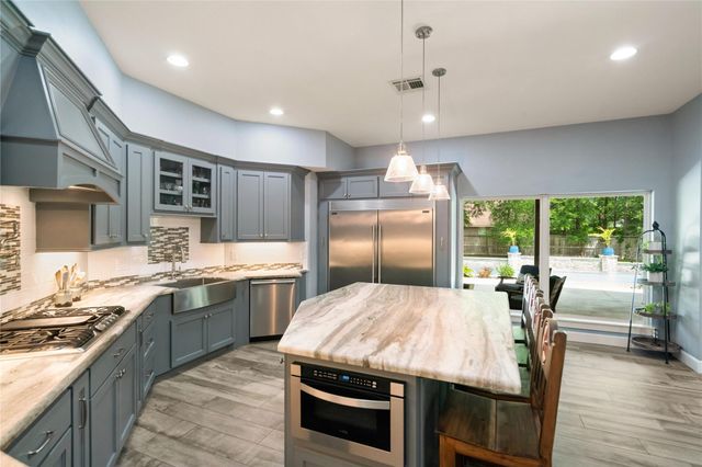 1202 Rocky Falls Lane, Huffman, TX 77336