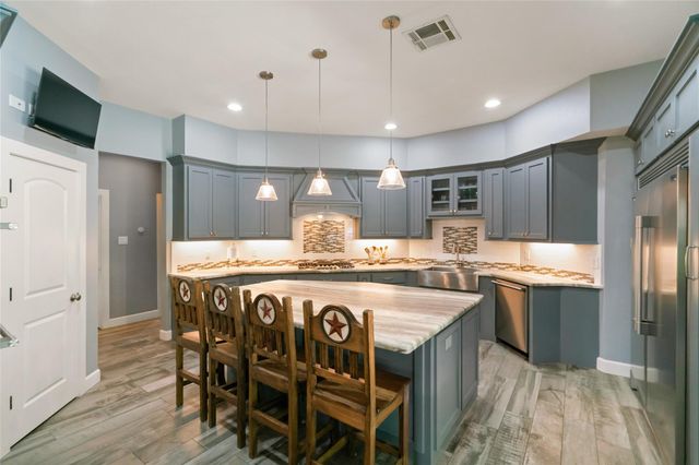 1202 Rocky Falls Lane, Huffman, TX 77336
