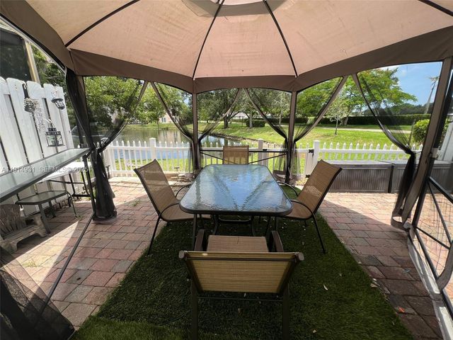 9894 Fairway Cove Lane, Plantation, FL 33324