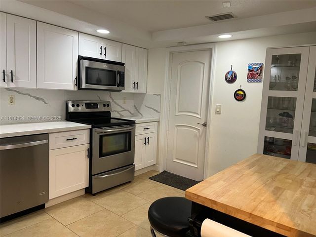 9894 Fairway Cove Lane, Plantation, FL 33324