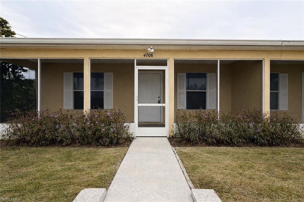 4708 Golfview BLVD, LEHIGH ACRES, FL 33973 — exterior