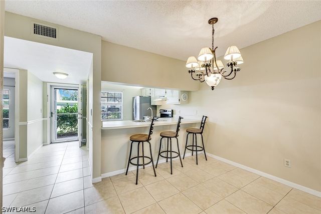 1702 Kings Lake BLVD 102, Naples, FL 34112