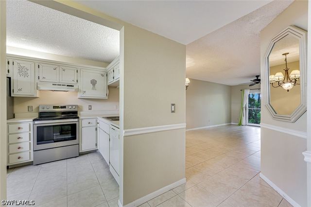 1702 Kings Lake BLVD 102, Naples, FL 34112
