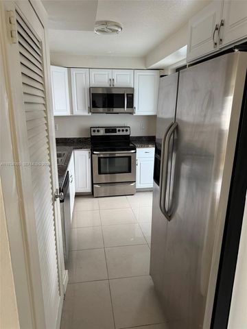 301 Golden Isles Dr 112, Hallandale Beach, FL 33009