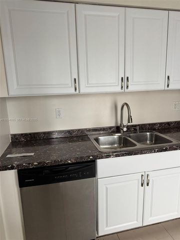 301 Golden Isles Dr 112, Hallandale Beach, FL 33009