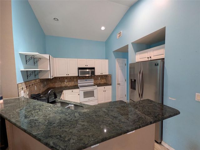 1813 JACKSON AVENUE, Lehigh Acres, FL 33972