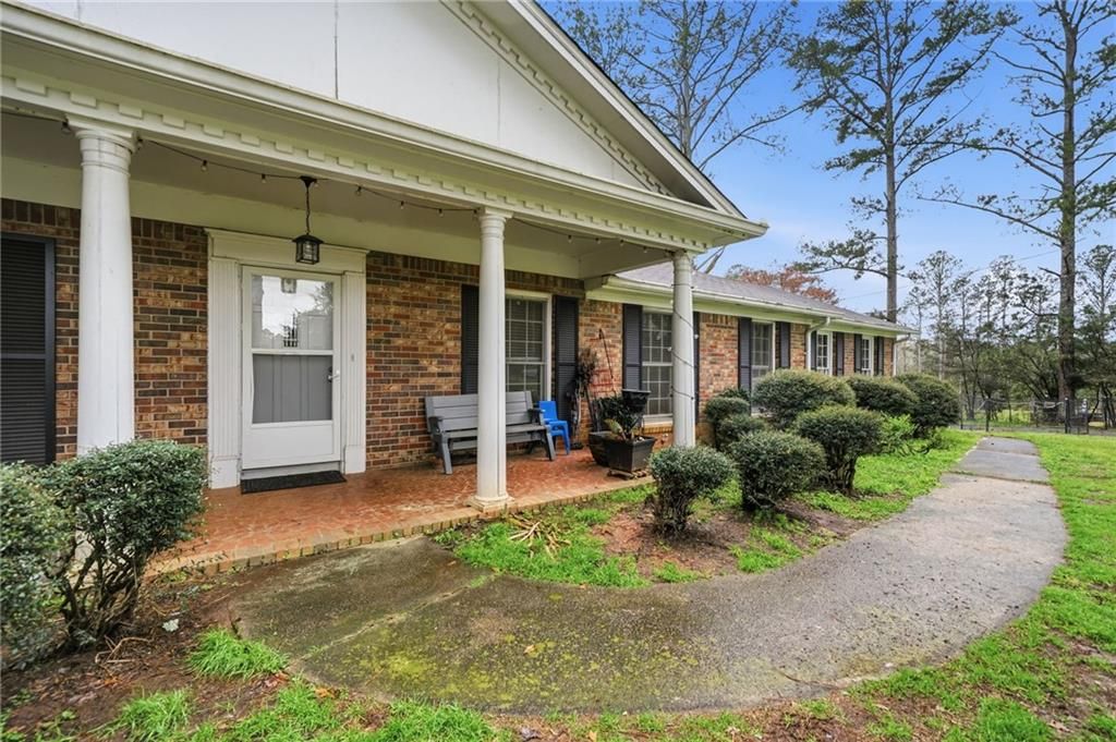 Image 3 of property listing at 1935 Flat Shoals Road SE, Conyers, GA 30013