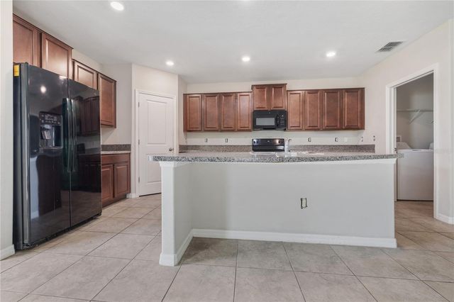 7407 ROSY PERIWINKLE COURT, Tampa, FL 33619