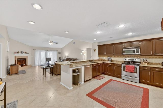 9410 PEBBLE GLEN AVENUE, Tampa, FL 33647