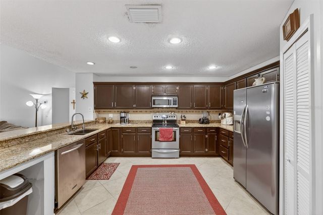 9410 PEBBLE GLEN AVENUE, Tampa, FL 33647