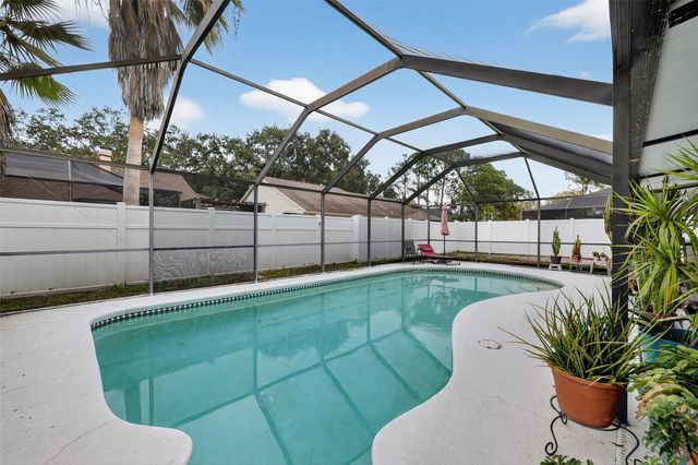 9410 PEBBLE GLEN AVENUE, Tampa, FL 33647