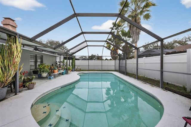 9410 PEBBLE GLEN AVENUE, Tampa, FL 33647