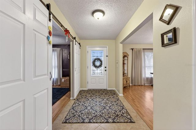 9410 PEBBLE GLEN AVENUE, Tampa, FL 33647