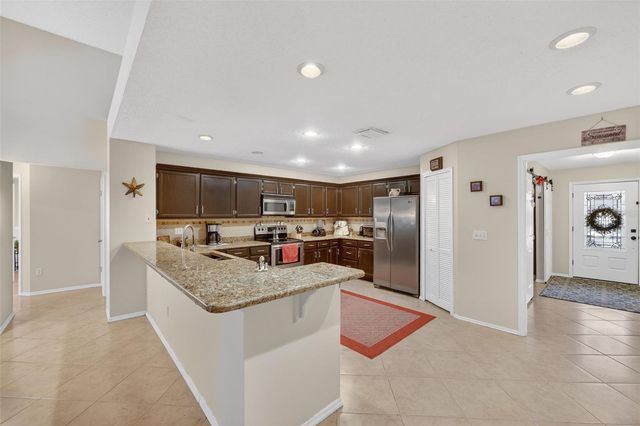 9410 PEBBLE GLEN AVENUE, Tampa, FL 33647