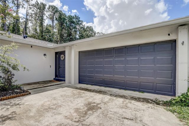 8691 CONTOURA DRIVE, Orlando, FL 32810