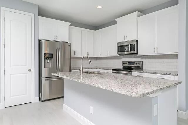 3673 SW Masilunas Street SW, Port St. Lucie, FL 34953