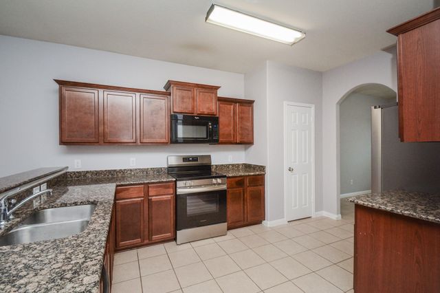 30915 W Lost Creek Boulevard, Magnolia, TX 77355