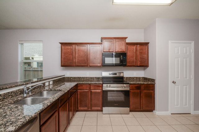 30915 W Lost Creek Boulevard, Magnolia, TX 77355