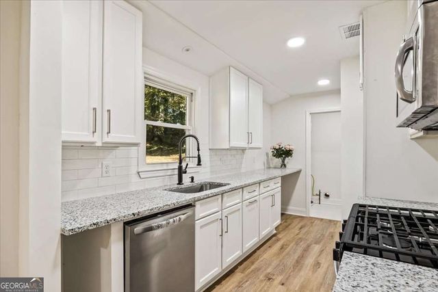 1348 Ridgewood Drive SW, Lilburn, GA 30047