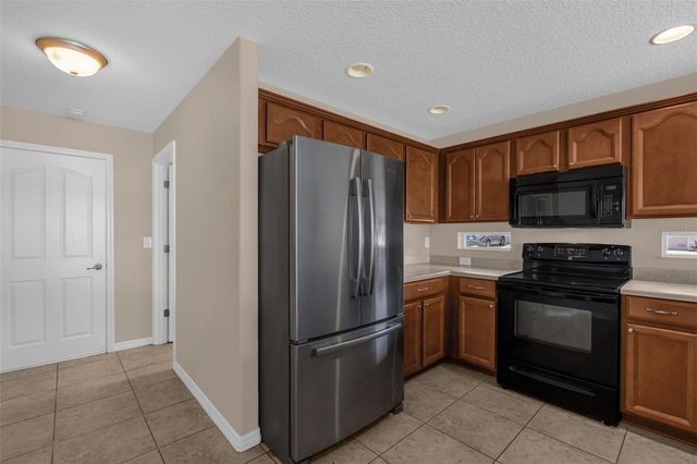 5901 CANDLE GLOW PLACE, Leesburg, FL 34748