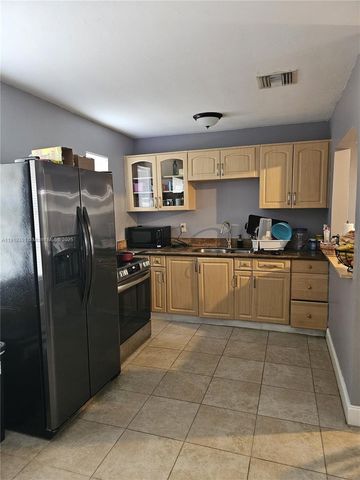 567 Tallulah Rd, Palm Beach, FL 33462