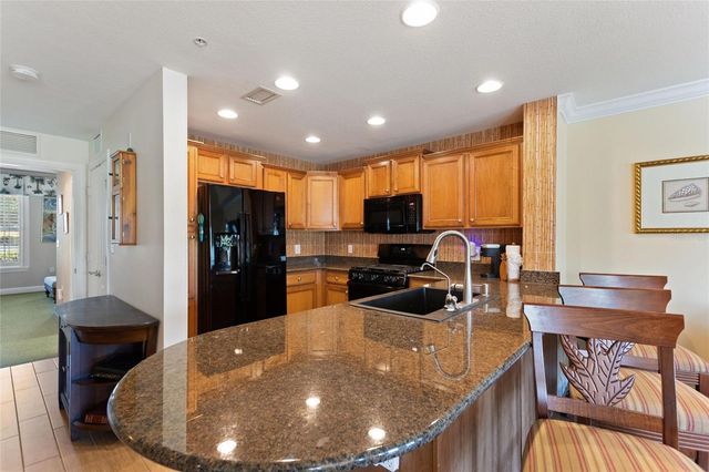 1593 HERITAGE CROSSING COURT G, Reunion, FL 34747