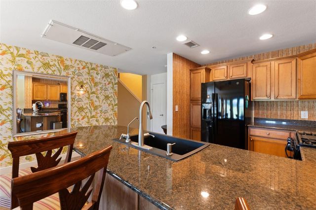 1593 HERITAGE CROSSING COURT G, Reunion, FL 34747