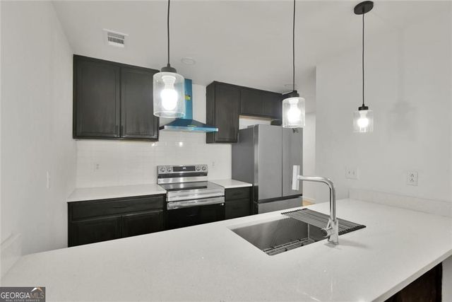 8051 Woodlake Drive, Riverdale, GA 30274