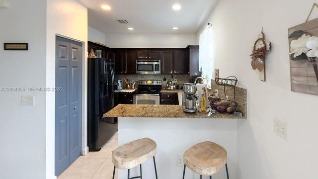 1001 NE 208th St ., Miami, FL 33179
